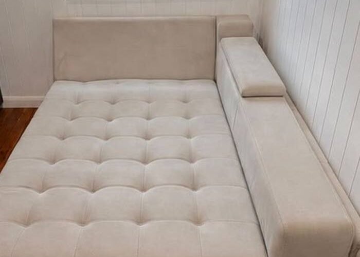 The same fabric chaise lounge after professional upholstery cleaning by Horizon Solutions Group