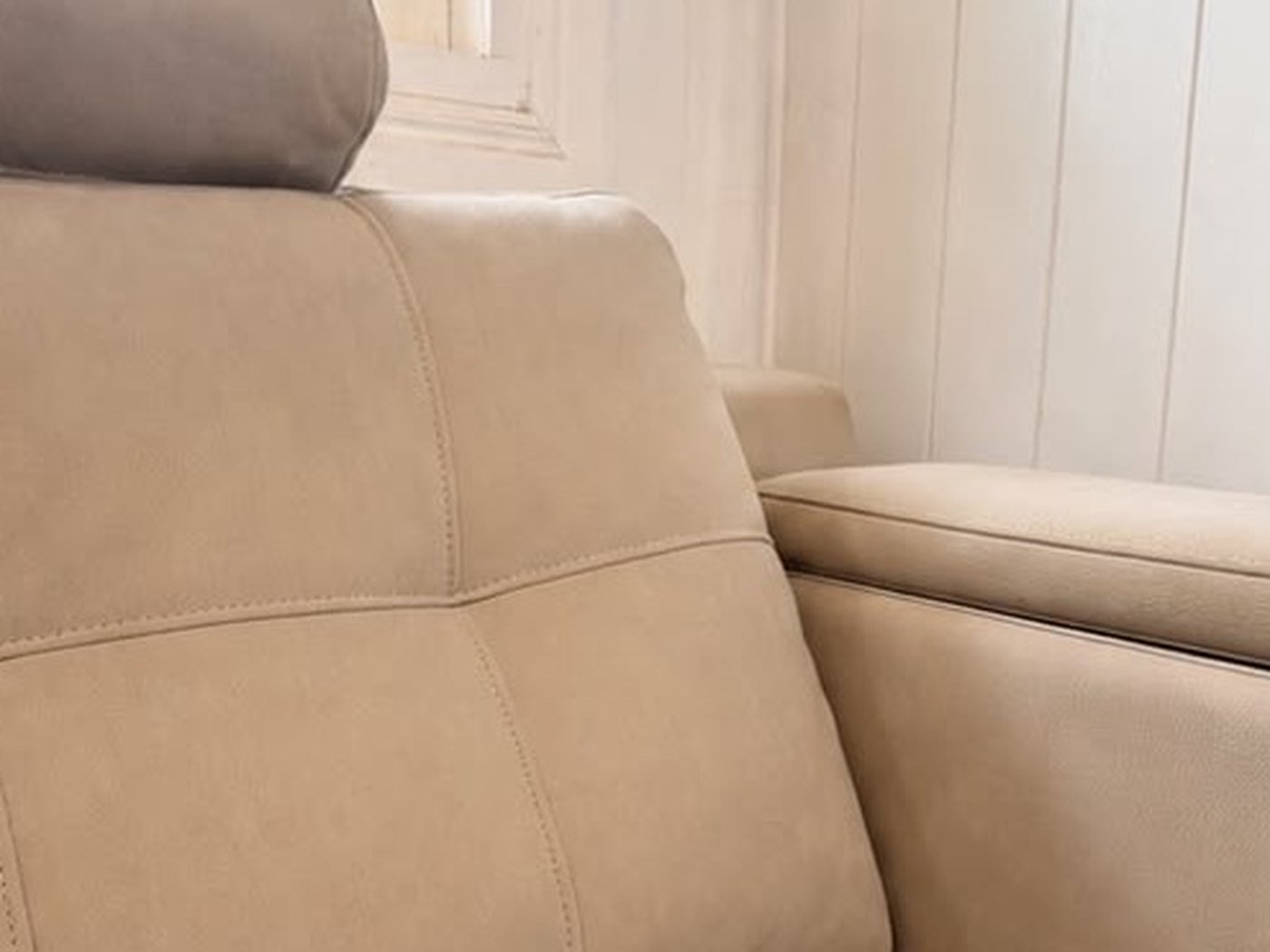 Suede-look lounge with a set-in mark on the backrest. After cleaning by Horizon Solutions Group.